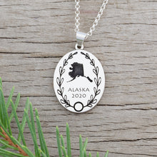 Load image into Gallery viewer, Personalized oval necklace engraved with country or state outline